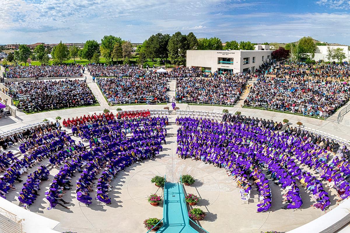 rooftop view of graduation plaza on graduation day showing all the graduates and all the families in attendance