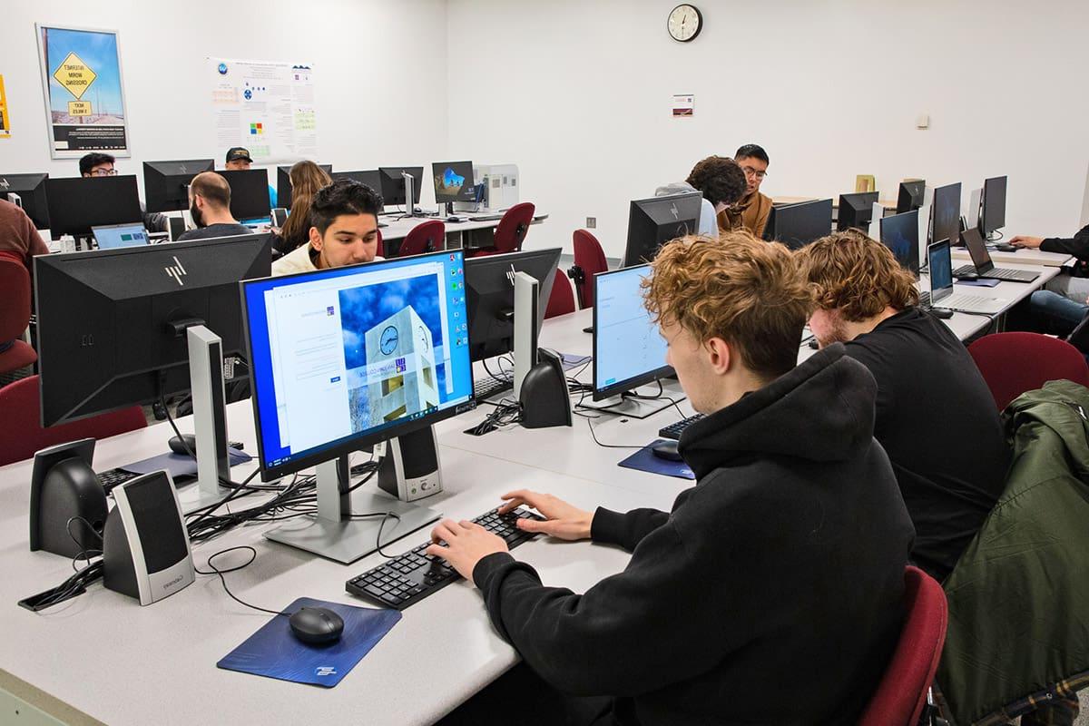 computer science students sign in to student system during class